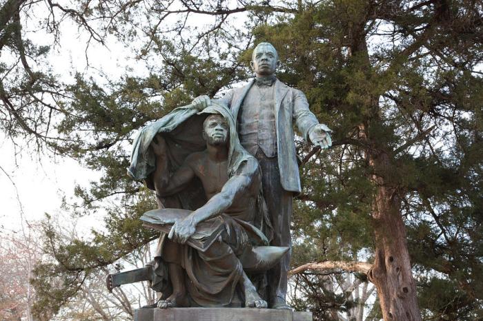 Lifting the veil of ignorance statue